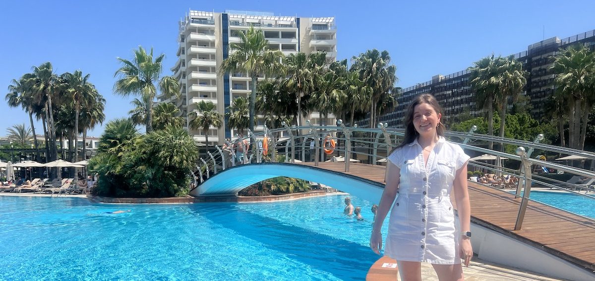 women standing by swimming pool Hotel rating meaning