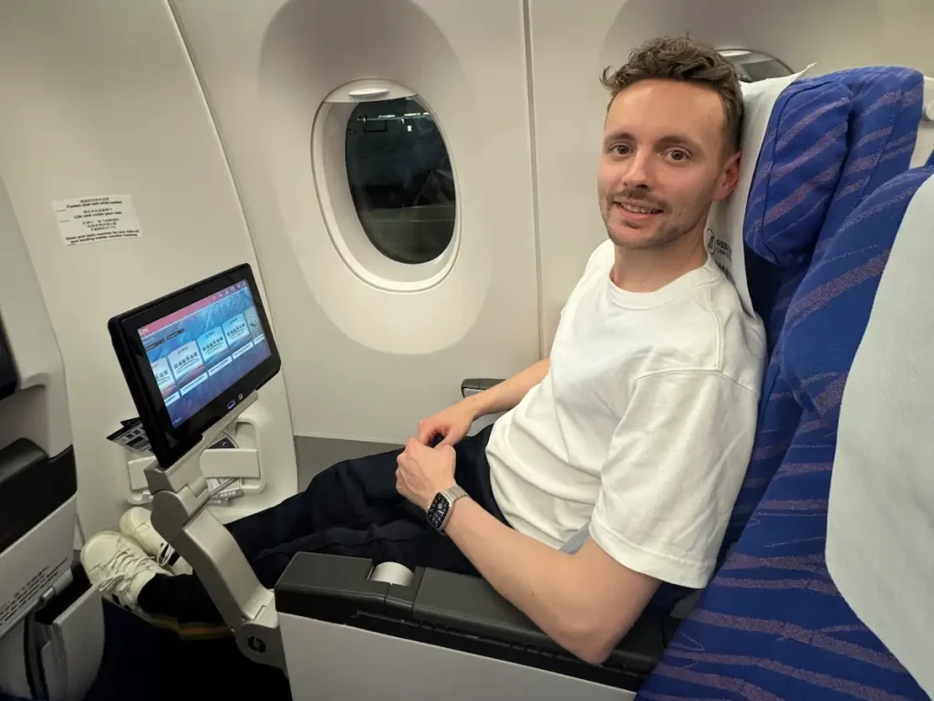 James in the best seat in economy on China Southern